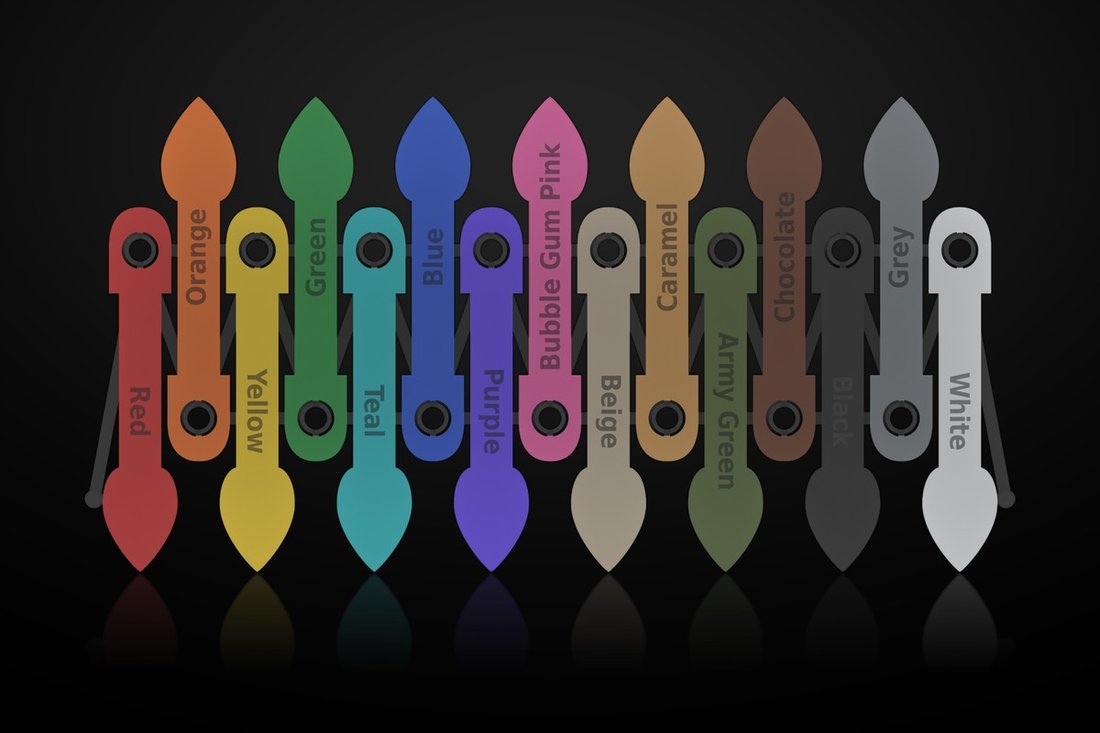 All fifteen color sample pieces snapped onto their frame, each printed with its color name
