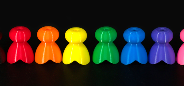 A row of colourful Stealth Retainers P-tainers