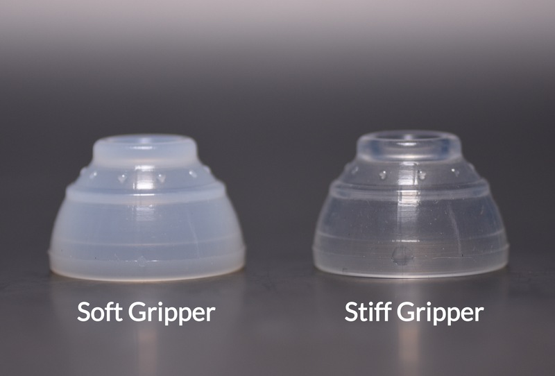 Two Stealth Retainers silicone grippers side by side, one labelled soft gripper and one labelled stiff gripper