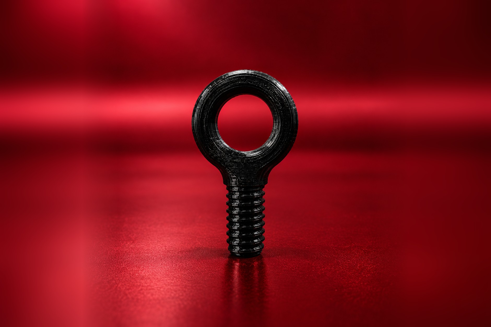 Plastic Tugging Ring, a black 3D-printed eye bolt with a 1/4-20 thread