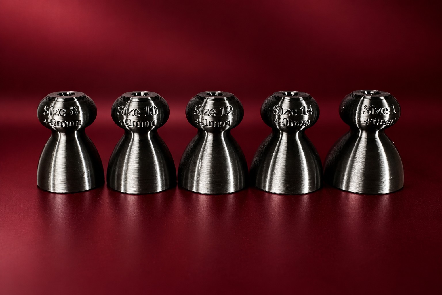 The five demo P-tainers in ascending size, each labelled Size 8 through 16.