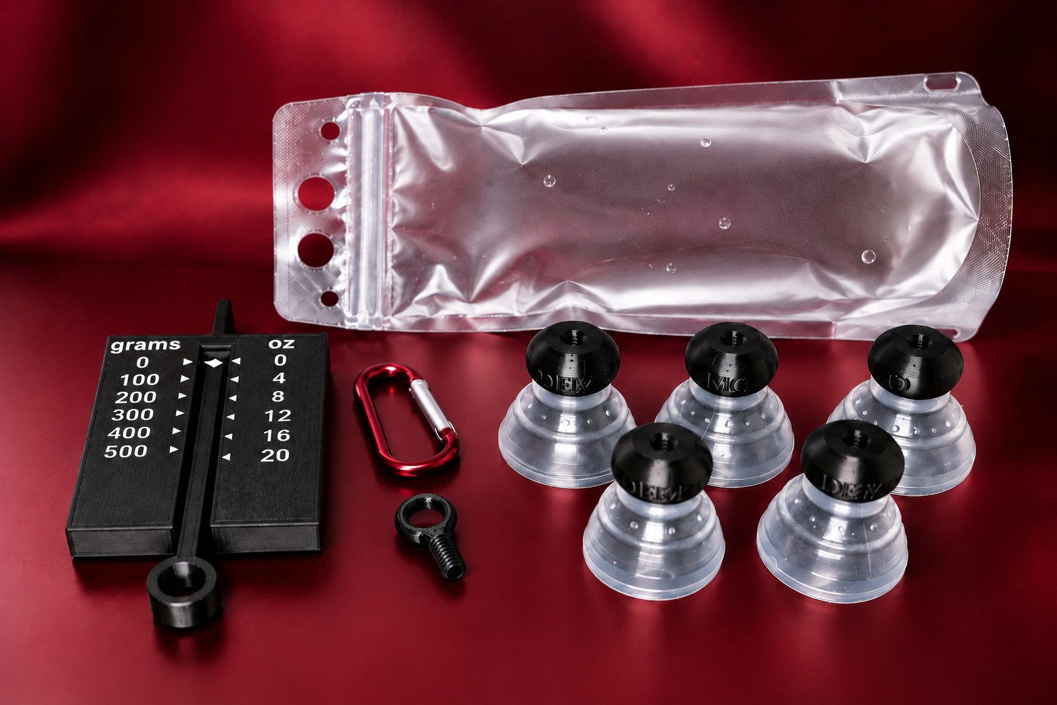 Everything in The Starter Kit: five demo P-tainers with grippers, tension gauge, collapsible water bottle with carabiner and the Plastic Tugging Ring
