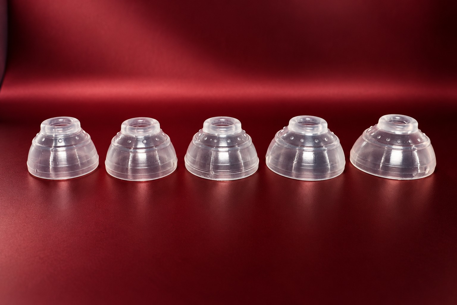 The five stiff silicone grippers included in the kit.